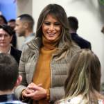 First lady Melania Trump listens as children tell her about 3D printing at Joint Base Elmendorf-Richardson, Alaska, on Friday, Nov. 10, 2017. Trump visited with children taking part in programs for the children of military members at the base in Anchorage, Alaska, before flying back to Washington, D.C. (AP Photo/Mark Thiessen)