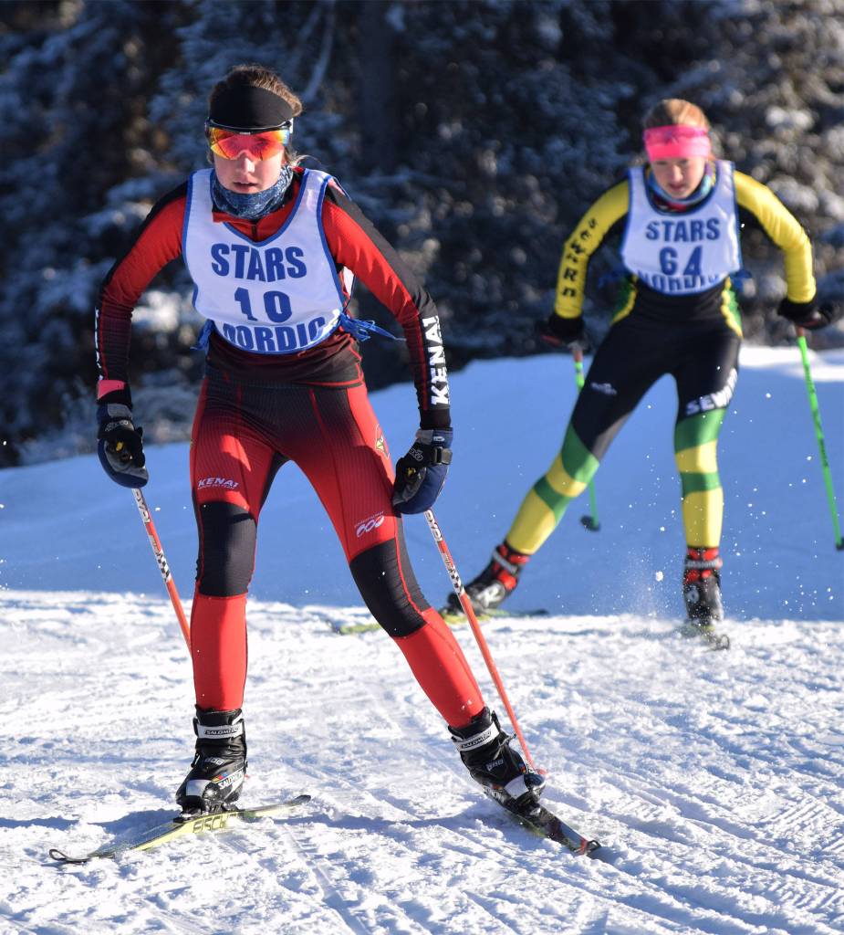 Kenai Central&rsquo;s Riana Boonstra (10) leads Seward&rsquo;s Ruby Lindquist early in the 2017 Kenai Peninsula Borough ski meet Feb. 11 on the Tsalteshi Trails. (Photo by Joey Klecka/Peninsula Clarion)
