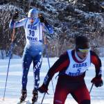Soldotna skier and eventual winner Koby Vinson (30) trails Kenai Central&rsquo;s Karl Danielson early in the 2017 Kenai Peninsula Borough boys race Feb. 11 on the Tsalteshi Trails. (Photo by Joey Klecka/Peninsula Clarion)