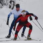 Kenai Central&rsquo;s Karl Danielson leads Soldotna&rsquo;s John-Mark Pothast up Kill Bill hill Tuesday afternoon at the Turkey Skate race on the Tsalteshi Trails in Soldotna. (Photo by Joey Klecka/Peninsula Clarion)