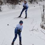 A pair of Soldotna skiers race down the Rabbit Loop hill Tuesday afternoon at the Turkey Skate race on the Tsalteshi Trails in Soldotna. (Photo by Joey Klecka/Peninsula Clarion)