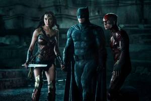 This image released by Warner Bros. Pictures shows Gal Gadot, from left, Ben Affleck and Ezra Miller in a scene from &ldquo;Justice League.&rdquo; (Clay Enos/Warner Bros. Entertainment Inc. via AP)