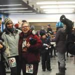 Margie McCord, Forrst Nelson, Mary Armstrong and Mary Bodnar pose for a photo before the Turkey Trot community run at the Soldotna Regional Sports Complex on Thursday in Soldotna. The group, calling themselves the &ldquo;Senior Strutters,&rdquo; walked the 5K race together in the 20-degree weather Thanksgiving morning. The proceeds from the race were donated to the Soldotna nonprofit Freedom House, a sober living home for women recovering from addiction. (Photo by Elizabeth Earl/Peninsula Clarion)