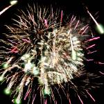 Above: Haylee Bush poses with Santa Claus, a close friend of Tim Navarre, in her favorite Christmas dress on Friday at the Kenai Visitor&rsquo;s Center. (Photo by Ben Boettger/Peninsula Clarion) Left: In spite of high winds, fireworks during Friday night&rsquo;s Christmas Comes to Kenai celebrations lasted for about half an hour. The photo above shows a selection of firework photos taken over the duration of the show superimposed over one another. (Photo by Kat Sorensen/Peninsula Clarion)
