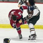 Kenai River Brown Bears defenseman Connor Scahill gets the better of Fairbanks Ice Dogs forward Tyler Deweese in a fight Friday, Nov. 24, 2017, at the Soldotna Regional Sports Complex. (Photo by Jeff Helminiak/Peninsula Clarion)
