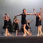 A group of Forever Dance Alaska dancers rehearses for performances at the Forever Christmas show at Kenai Central High School on Tuesday in Kenai. The show, which will run Friday and Saturday at 7 p.m., has a Christmas theme and includes all the dancers of all ages from the Soldotna-based studio. Tickets are $5 at the door. (Photo by Elizabeth Earl/Peninsula Clarion)