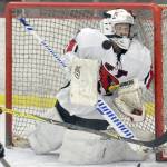 Kenai Central goaltender Josh Tree makes a save against Colony on Thursday, Nov. 30, 2017, at the Kenai Multi-Purpose Facility. (Photo by Jeff Helminiak/Peninsula Clarion)