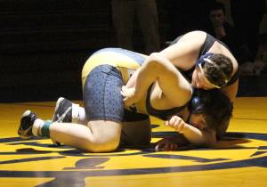 Homer&rsquo;s Richard Brock struggles to break free from Colony High School&rsquo;s Brandon Holmes during a wrestling match Thursday, Nov. 30, 2017 at the Alice Witte Gymnasium in Homer. (Photo by Megan Pacer/Homer News)