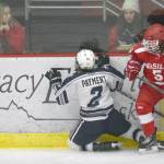 Soldotna&rsquo;s Seth Payment gets checked off the puck by Wasilla on Friday, Dec. 1, 2017, at the Soldotna Regional Sports Complex. (Photo by Jeff Helminiak/Peninsula Clarion)
