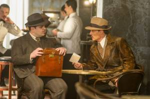 This image released by Twentieth Century Fox shows Josh Gad, left, and Johnny Depp in a scene from &ldquo;Murder on the Orient Express.&rdquo; (Nicola Dove/Twentieth Century Fox via AP)