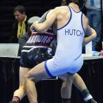 Soldotna junior Gideon Hutchison grapples with Wasilla&rsquo;s Alex Logsdon in the 120-pound final Saturday night at the Division I state wrestling championships at the Alaska Airlines Center in Anchorage. (Photo by Joey Klecka/Peninsula Clarion)