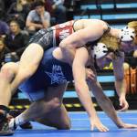 Soldotna&rsquo;s Bechler Metcalf (bottom) fights against Wasilla&rsquo;s Andrue Shepersky in the 152-pound final Saturday night at the Division I state wrestling championships at the Alaska Airlines Center in Anchorage. (Photo by Joey Klecka/Peninsula Clarion)