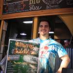 Pizza Boys manager Robbie Smithwick poses with an entry form container on Dec. 18. Pizza Boys is one of 19 Soldotna businesses participating in the &ldquo;Unwrap Soldotna&rdquo; campaign.