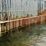 The weir at the top of Cook Inlet Aquaculture Association&rsquo;s Paint River fish ladder, photographed Friday, Sept. 2, 2016 near the McNeil River Game Sanctuary, Alaska, screens fish into a small opening before allowing them to pass into the upper part of the Paint River. CIAA operates the fish ladder to allow salmon to pass into the upper reaches of the remote river system to spawn. (Photo by Elizabeth Earl/Peninsula Clarion, file)