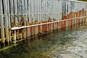 The weir at the top of Cook Inlet Aquaculture Association&rsquo;s Paint River fish ladder, photographed Friday, Sept. 2, 2016 near the McNeil River Game Sanctuary, Alaska, screens fish into a small opening before allowing them to pass into the upper part of the Paint River. CIAA operates the fish ladder to allow salmon to pass into the upper reaches of the remote river system to spawn. (Photo by Elizabeth Earl/Peninsula Clarion, file)