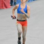 Women&rsquo;s champ Allie Ostrander of Soldotna shows the effects of four tumbles at the top of the mountain Tuesday, July 4, 2017, in Seward. (Photo by Jeff Helminiak/Peninsula Clarion)