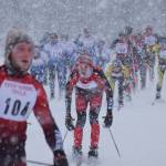 Kenai Central&rsquo;s Eric Kempf eyes teammate Patrick Michels (104) ahead of him at the start of the Kenai Klassic boys ski race Jan. 20, 2017, at the Kenai Golf Course. (Photo by Joey Klecka/Peninsula Clarion)