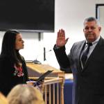 Borough Clerk Johni Blankenship (left) administers the oath of office to Borough Mayor Charlie Pierce during a swearing-in ceremony at the George A. Navarre Borough Administration Building on Monday, Nov. 6, 2017 in Soldotna, Alaska. Pierce won the mayor&rsquo;s seat in a runoff election held Oct. 24, narrowly defeating opponent Linda Hutchings with a margin of 45 votes. (Photo by Elizabeth Earl/Peninsula Clarion)