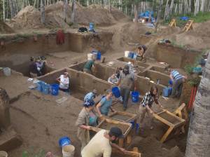 In this August 2013 photo provided by the University of Alaska, excavators work at the Upward Sun River discovery site in Alaska. According to a report released on Wednesday, DNA from an infant who died in Alaska some 11,500 years ago, found at this site, is giving scientists the best look yet at the genetics of the ancestors of today&rsquo;s native peoples of the Americas. (Ben Potter/University of Alaska via AP)