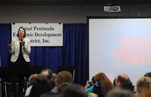 Alyssa Rodrigues, the development manager within the Alaska Department of Commerce, Community and Economic Development&rsquo;s Division of Economic Development, speaks to the attendees at the Kenai Peninsula Economic Development District&rsquo;s Industry Outlook Forum on Wednesday, Jan. 10, 2017 in Soldotna, Alaska. (Photo by Elizabeth Earl/Peninsula Clarion)