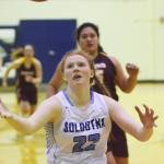 Soldotna sophomore Kianna Holland chases after the ball Saturday night against the Dimond Lynx at Soldotna High School. (Photo by Joey Klecka/Peninsula Clarion)