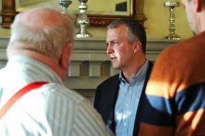 Sen. Dan Sullivan (R-Alaska) speaks to constituents after addressing the members of three Kenai- and Soldotna-area Rotary Clubs at Froso&rsquo;s Restaurant on Monday in Soldotna. Sullivan, entering his third year as U.S. Senator for the state, said he found reasons to be optimistic about federal actions regarding the state in 2018. (Photo by Elizabeth Earl/Peninsula Clarion)