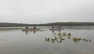Participants in the Kenai National Wildlife Refuge&rsquo;s &ldquo;Stick and String Naturalist Camp&rdquo; canoe across Dolly Varden Lake in hopes of catching rainbow trout or arctic char on flies that they tied themselves. (Photo courtesy Kenai National Wildlife Refuge)