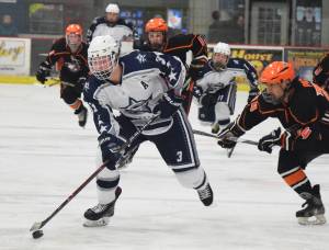 Soldotna sophomore Galen Brantley III breaks away for a shot at the West Anchorage goaltender Saturday afternoon at the Soldotna Regional Sports Complex. (Photo by Joey Klecka/Peninsula Clarion)