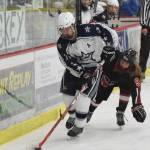 Soldotna&rsquo;s Wyatt Medcoff evades Kenai&rsquo;s Jordan Stock (right) Saturday night at the Soldotna Regional Sports Complex. (Photo by Joey Klecka/Peninsula Clarion)