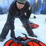 Kenai National Wildlife Refuge ecologist Mark Laker preps a 3DR surveillance drone equipped with a heat sensor during a prescribed burning on Thursday, Feb. 1. The burning is part of a hazardous fuel reduction project being carried out by the refuge. (Photo by Erin Thompson/Peninsula Clarion)