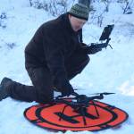Kenai National Wildlife Refuge ecologist Mark Laker preps a 3DR surveillance drone equipped with a heat sensor during a prescribed burning on Thursday, Feb. 1. (Photo by Erin Thompson/Peninsula Clarion)