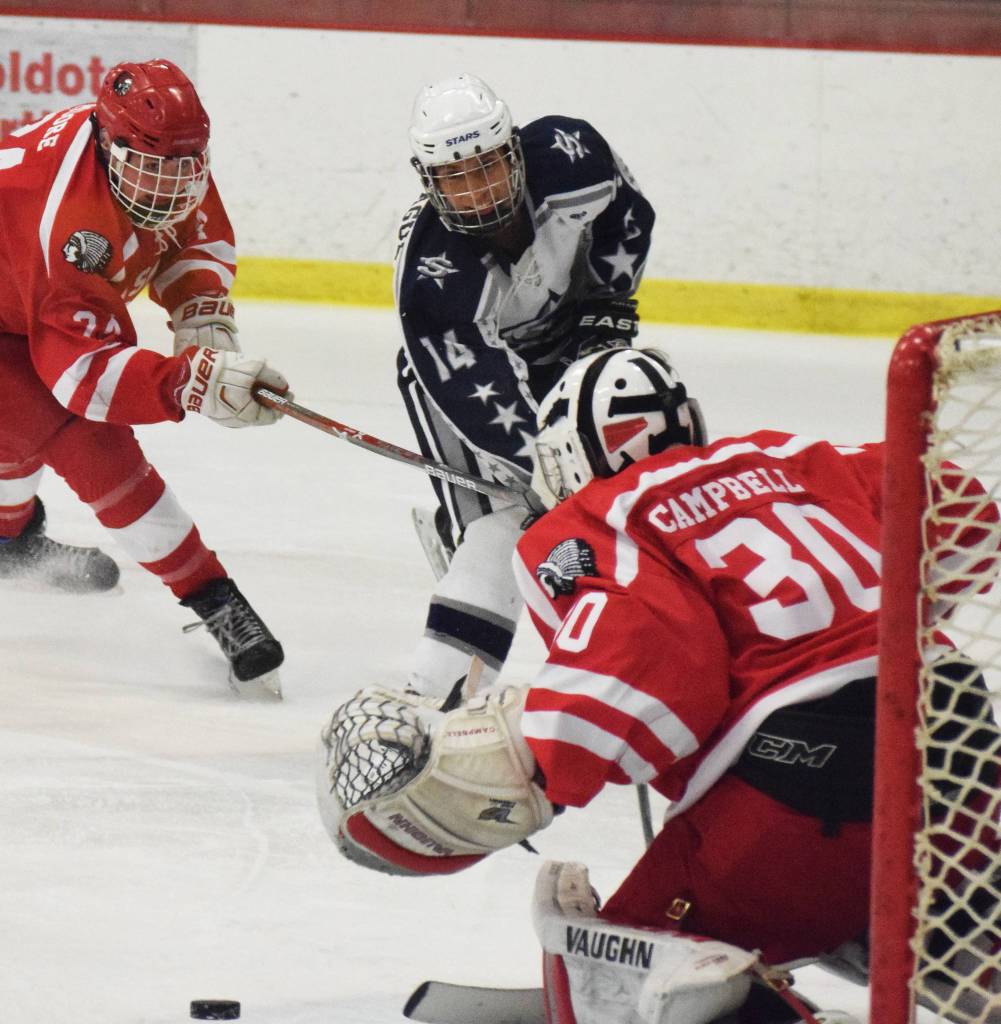 Soldotona&rsquo;s Alex Montague puts a shot on Wasilla goalie Aaron Campbell Thursday night in a North Star Conference tournament semifinal at the Soldotna Regional Sports Complex. (Photo by Joey Klecka/Peninsula Clarion)