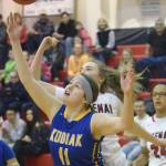 Kodiak&rsquo;s Katrina Pruitt and Kenai Central&rsquo;s Liz Hanson battle for the ball Friday at Kenai Central High School. (Photo by Jeff Helminak/Peninsula Clarion)