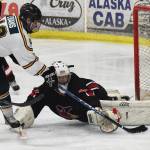 Kenai Central goalie Josh Tree blocks a shot from Colony&rsquo;s Tae&rsquo;jean Evans Friday in a North Star Conference tournament semifinal at the Soldotna Regional Sports Complex. (Photo by Joey Klecka/Peninsula Clarion)