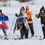 Sara Bundy (127), Mary King (121) and Patricia Berkhahn (125) lead a group of skiers Sunday, Feb. 4, 2018, at the Ski For Women at Tsalteshi Trails. (Photo by Jeff Helminiak/Peninsula Clarion)