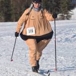 Chisato Johnson shows off the sumo costume that was voted best costume at the Ski For Women on Sunday, Feb. 4, 2018, at Tsalteshi Trails. (Photo by Jeff Helminiak/Peninsula Clarion)