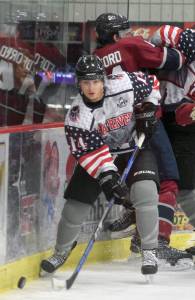 Kenai River Brown Bears forward Ross Hanson works out of the corner Nov. 3, 2017, at the Soldotna Regional Sports Complex against the Fairbanks Ice Dogs. (Photo by Jeff Helminiak/Peninsula Clarion)