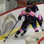 Kenai River&rsquo;s Emil Ezitis (front) works to keep the puck from Wilkes-Barre/Scranton defenseman Thomas Farrell Friday night at the Soldotna Regional Sports Complex. (Photo by Joey Klecka/Peninsula Clarion)