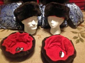 This undated file photo shows hats trimmed with sea otter fur, offered by Alaska Native Marcus Gho&rsquo;s Tuvraqtuq online retail store based in Juneau. (Marcus Gho via AP, file)