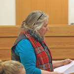 Kenai Peninsula Youth Court Director Ginny Espenshade discusses legal principles with students at the Old Kenai Courthouse on Jan. 30. A diversion program for youth offenders, the youth court allows youth facing certain misdemeanor charges to have their cases heard before peers. (Photo by Erin Thompson/Peninsula Clarion)