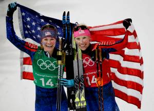 United States&rsquo; Jessica Diggins, left, and Kikkan Randall celebrate after winning the gold medal in the women&rsquo;s team sprint freestyle cross-country skiing final at the 2018 Winter Olympics in Pyeongchang, South Korea, Wednesday, Feb. 21, 2018. (AP Photo/Kirsty Wigglesworth)