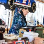 A woman checks out items offered for auction during the WOW fundraiser for cancer patients held on Saturday, Feb. 24, 2018 at Freddie&rsquo;s Roadhouse in the Caribou Hills near Ninilchik, Alaska. (Photo by Erin Thompson/Peninsula Clarion)