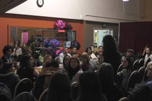 The Juneau Arts and Humanities Council (JAHC) board listens to community member Catherine Hatch at its Wednesday, Feb. 21, 2018 board meeting. More than 100 people showed up to speak about the issue of cultural appropriation. (Alex McCarthy | Juneau Empire)