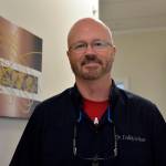Dr. Todd Wortham of Denali Family Dentistry showed Kenai Central High School students the inner workings of his dental office in Kenai on Wednesday as part of the job shadow program held by the Kenai Chamber of Commerce and Alaska Job Center in Kenai. (Photo by Maria Salzetti/For the Clarion)