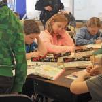 Fifth-graders fill out D.A.R.E. workbooks during a lesson at Soldotna Elementary School on Wednesday, Feb. 28. (Photo by Erin Thompson/Peninsula Clarion)