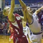 Preben Strende of Kenai Central (left) and Caleb Spence of Soldotna contest a rebound Saturday night at Soldotna High School. (Photo by Joey Klecka/Peninsula Clarion)