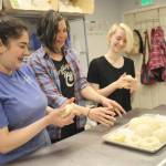 Kristeena Negus and Pamela Parker show Molly Nusbaum the art of making New York style bagels.