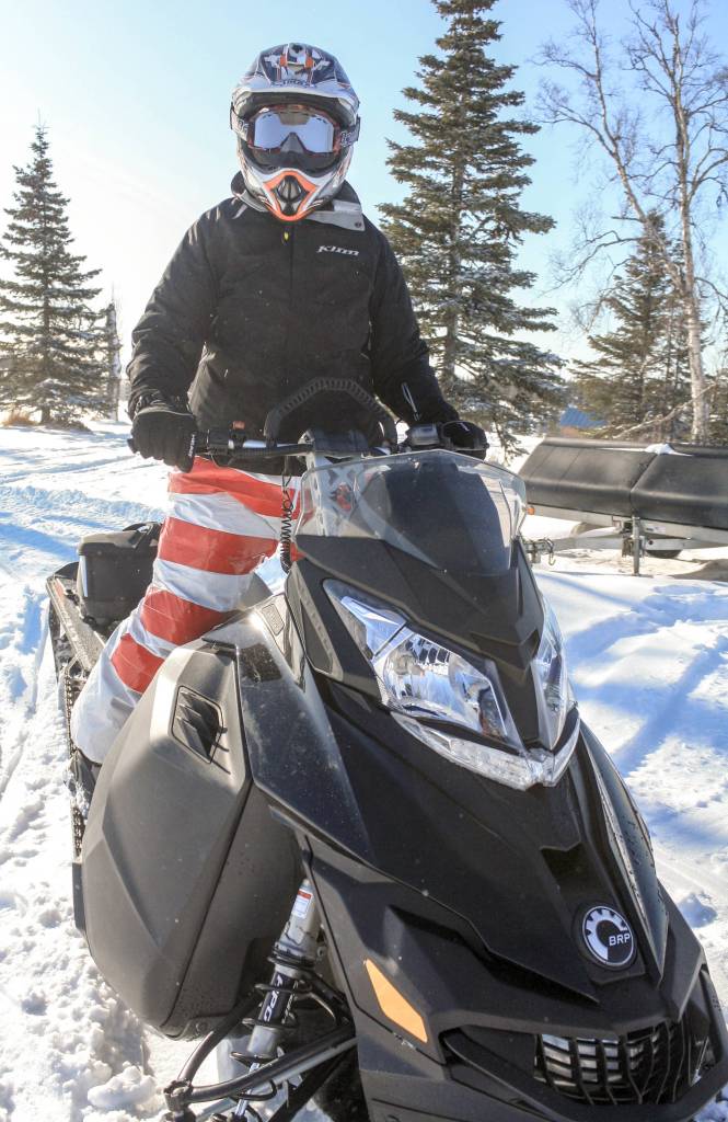 A rider returns from a 50-mile loop of the Caribou Hills as part of the WOW fundraiser for cancer patients held on Saturday, Feb. 24, 2018 near Ninilchik, Alaska. (Photo by Erin Thompson/Peninsula Clarion)