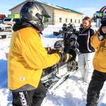 Riders return from a 50-mile loop of the Caribou Hills as part of the WOW fundraiser for cancer patients held on Saturday, Feb. 24, 2018 near Ninilchik, Alaska. (Photo by Erin Thompson/Peninsula Clarion)