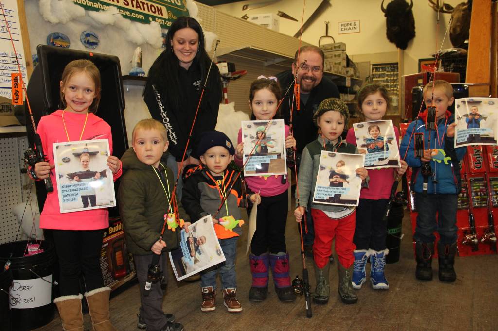 Little kids catch big fish & prizes in Trustworthy Ice Fishing Derby.